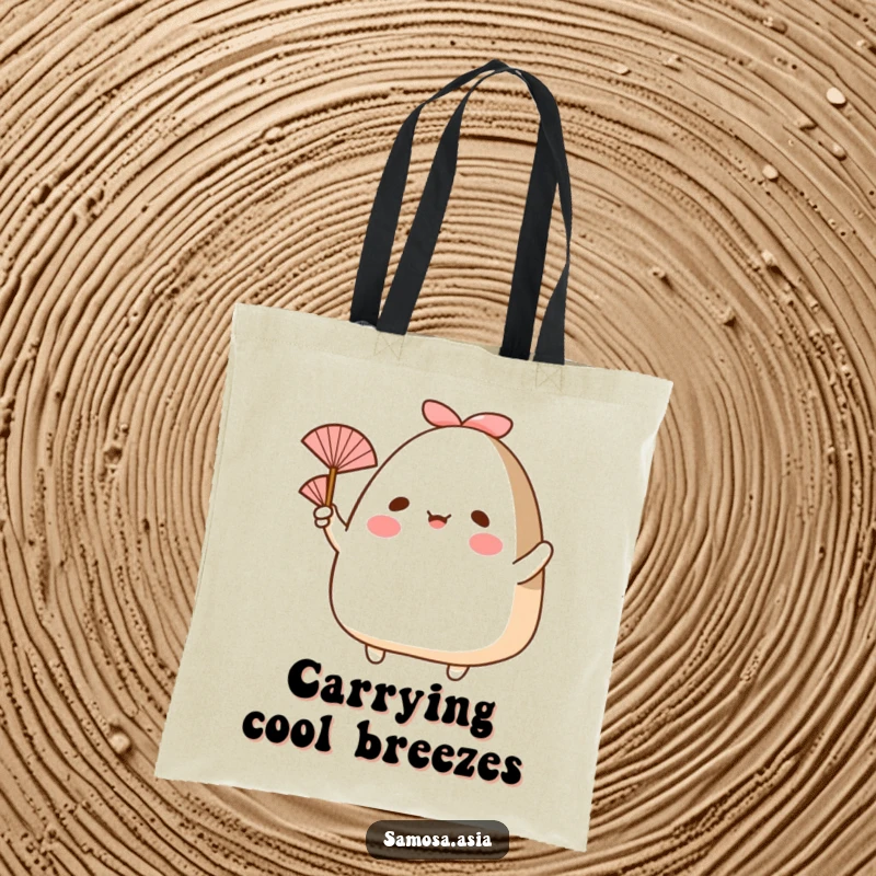 Funny tote bag showcasing a happy onigiri with arms, waving a small fan, perfect for carrying items in style.