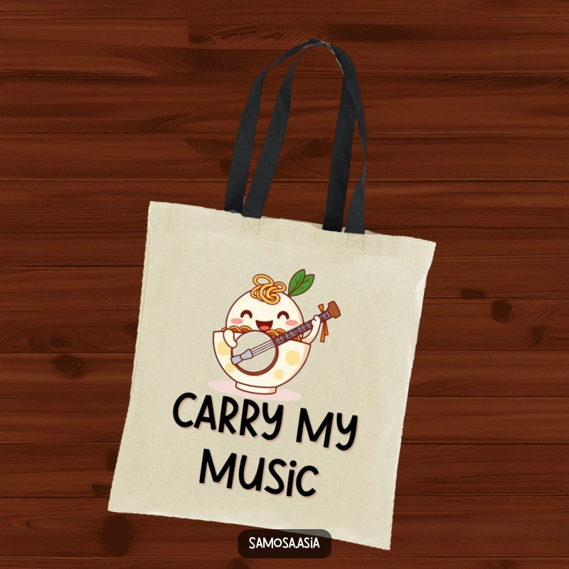 Funny tote bag with a happy ramen bowl on noodle arms playing a tiny banjo, perfect for stylish and humorous everyday use.